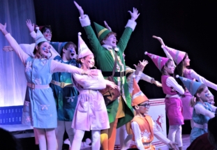 AET Production of Elf the Musical - Kevin Orduno as Buddy with Elves - Ben Wiese Photographer